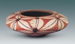 a painted pottery bowl of the Dawenkou culture that existed 4,500-2,500 years ago. It was unearthed at Peixian County, Jiangsu Province